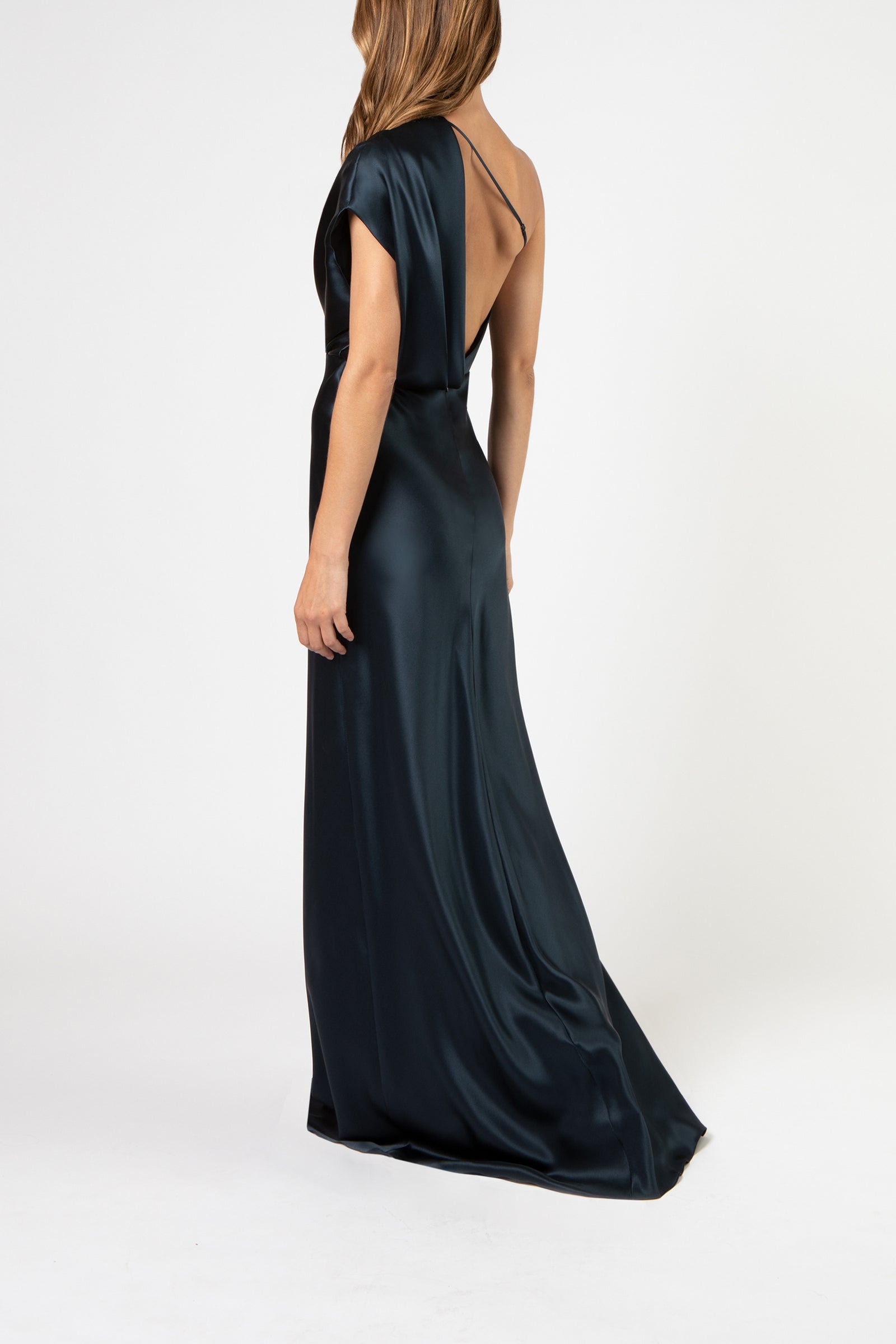 Asymmetrical open back draped gown